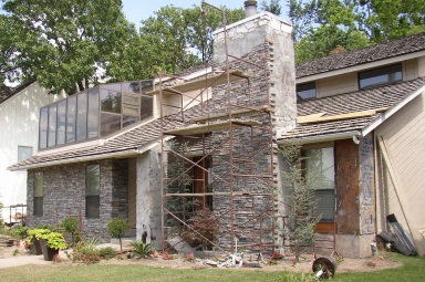 Pride Masonry (Pryor, Oklahoma) installing faux stone veneer